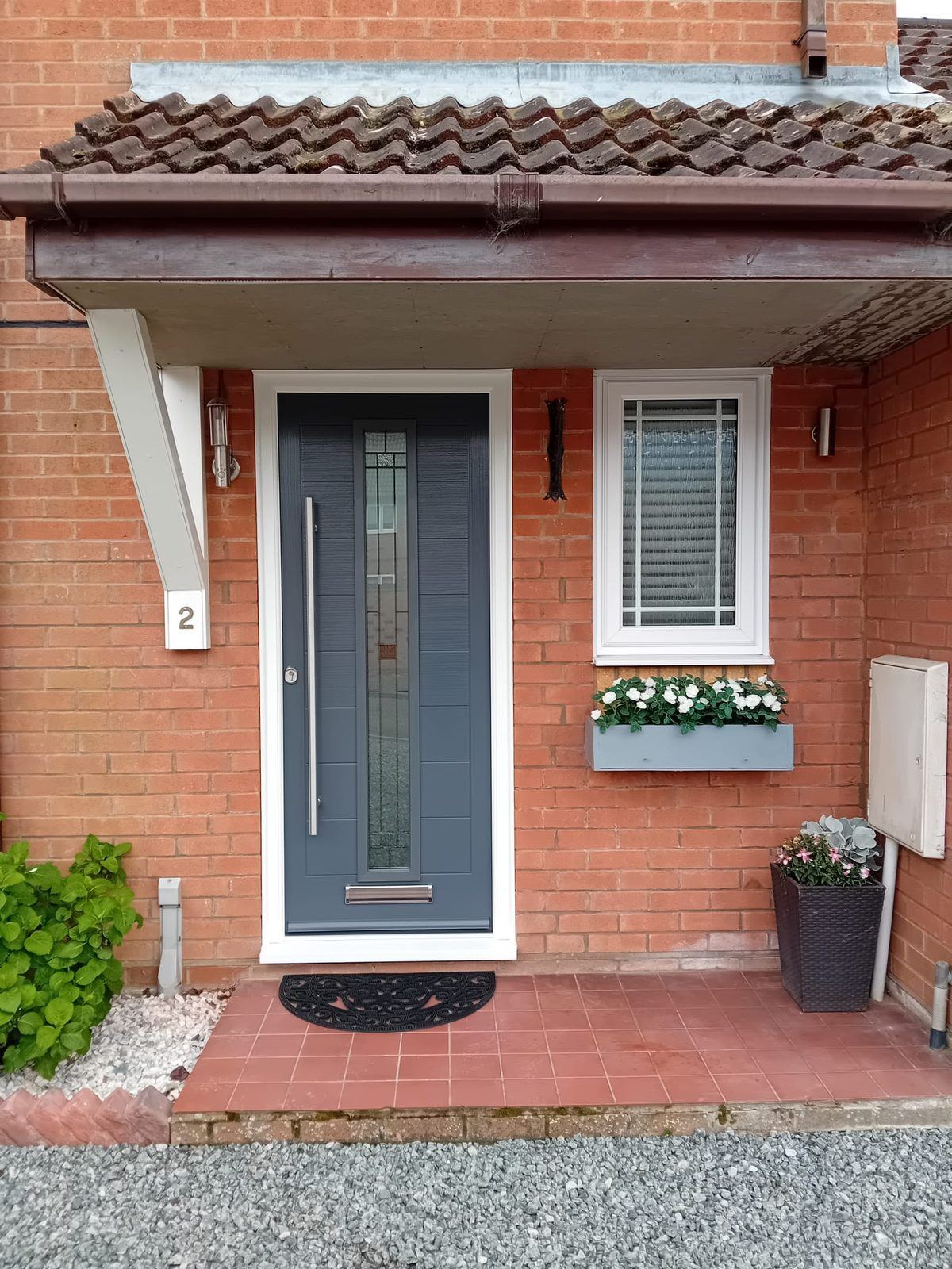 A slate grey composite front door, one of the many door styles BBH Limited Home Improvements supplies and fits across Norfolk