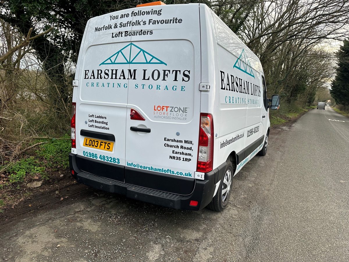 The Earsham Lofts van on a Norfolk lane, signwritten for loft ladders, loft boarding and loft insulation