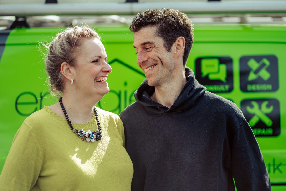 Nigel and Claudette Day, directors of Energie Solutions Ltd, in front of a branded company van