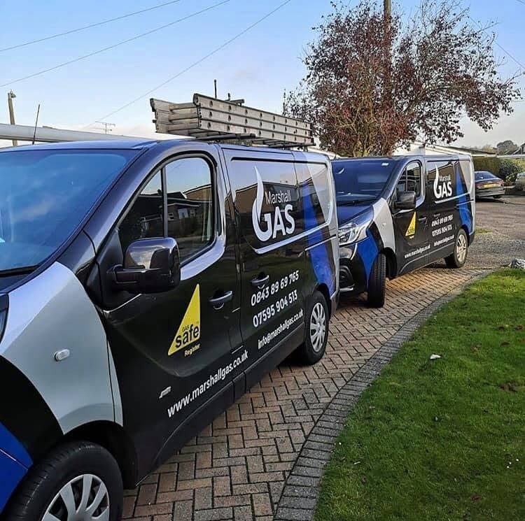 Branded Marshall Gas vans carrying the Gas Safe Register mark, ready for work across Suffolk