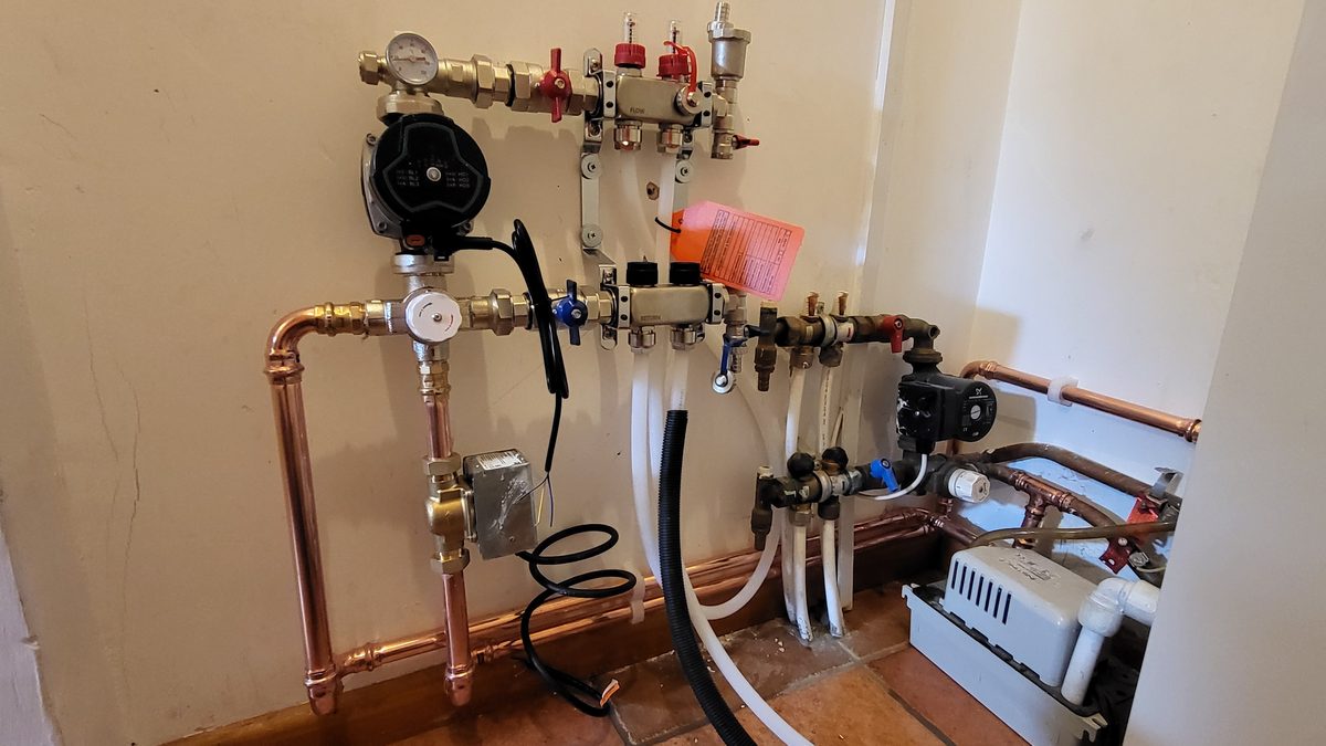 The underfloor heating manifold and controls installed by Sentinal Industries as part of the kitchen knock through